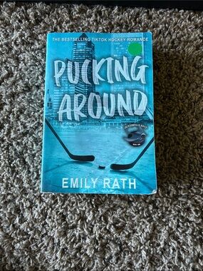 Source Unknown Pucking Around Coffee Table Book - Teal Blue Cover
